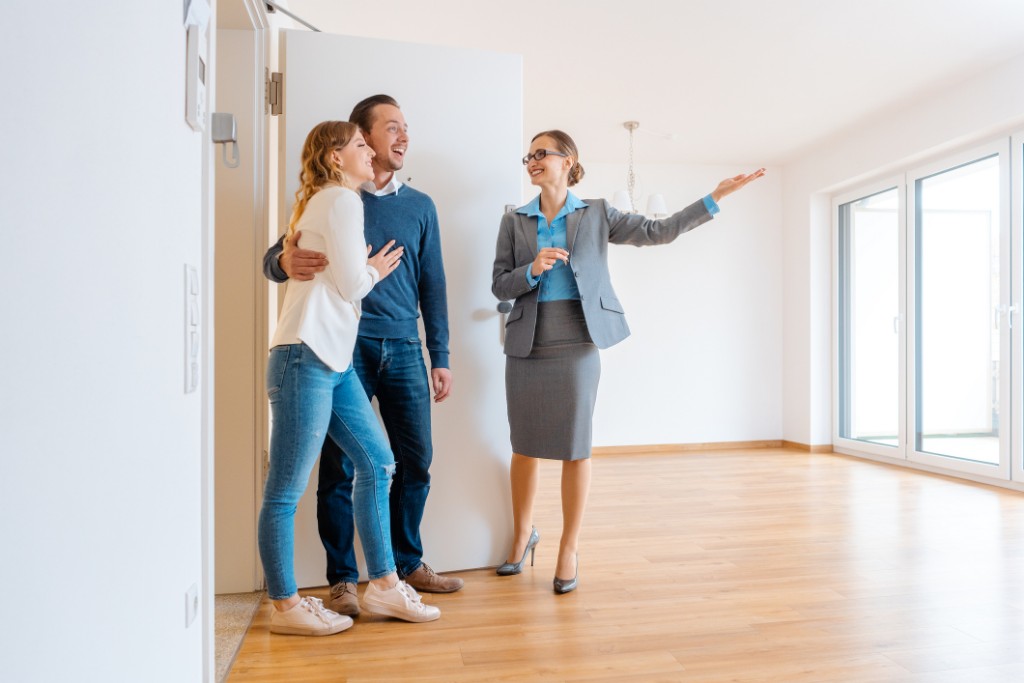 Couple and Realtor in a Room